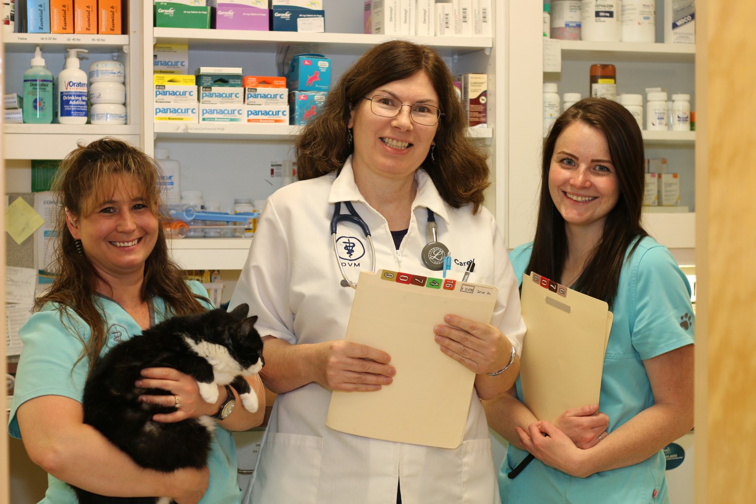 Three of our veterinarians smiling for a picture