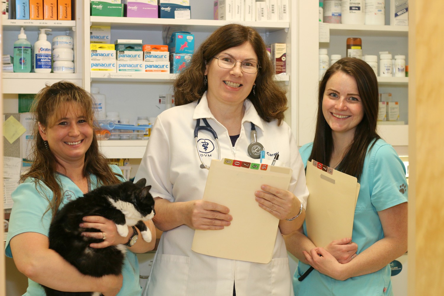 Three of our veterinarians smiling for a picture